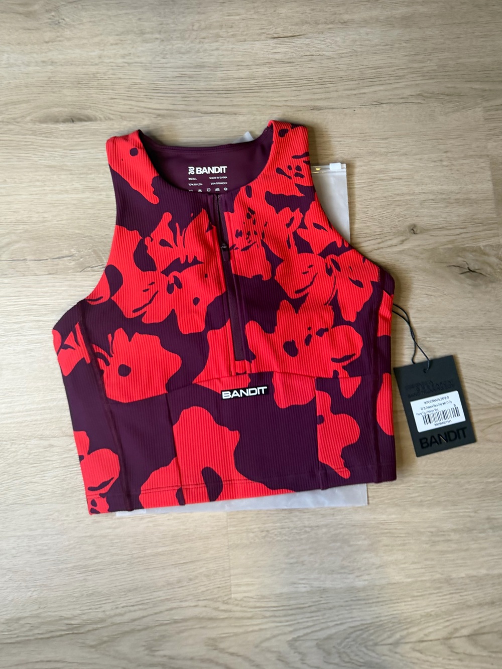 NWT bandit running cadence zip front race crop